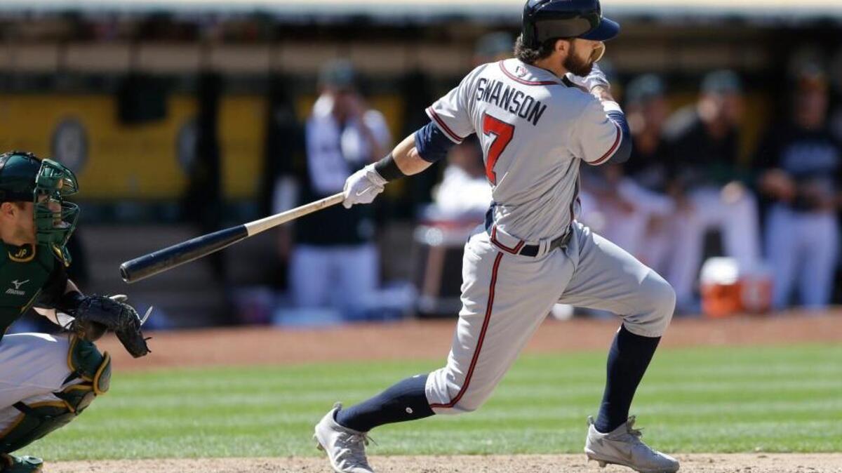 Atlanta’s Dansby Swanson rips a double against Oakland on Sunday.