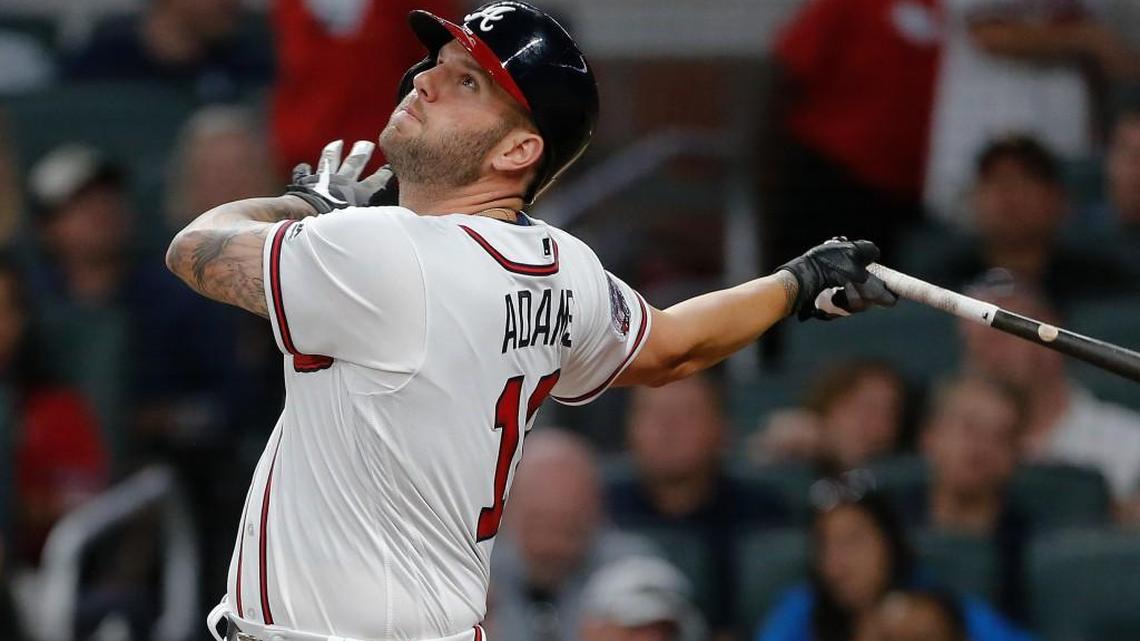 Atlanta’s Matt Adams follows through on a home run at SunTrust Park.