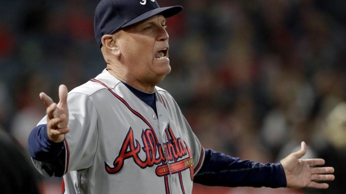 Atlanta Braves manager Brian Snitker reacts after getting thrown out of the baseball game by first base umpire Ted Barrett while arguing a call during the fifth inning against the Los Angeles Angels in Anaheim, Calif., Wednesday, May 31, 2017.