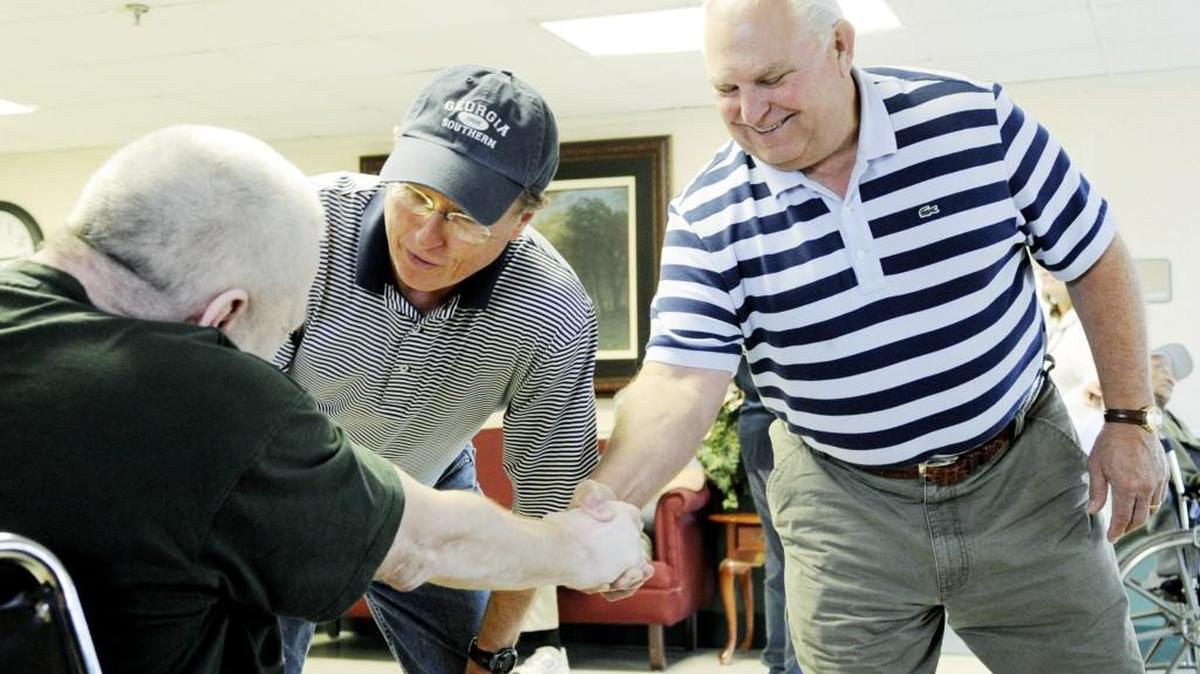 Joe McDaniel, middle, retired from Musella Baptist Church on June 11.