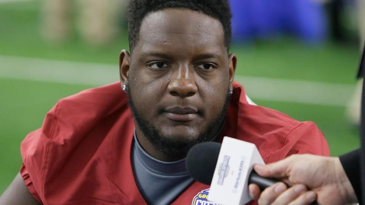 Alabama offensive lineman Cam Robinson (74) listens to a question during the media day for the NCAA Cotton Bowl in December.