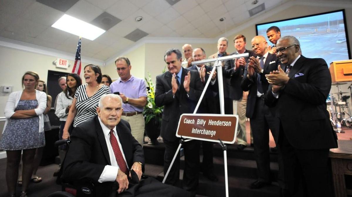 Billy Henderson is pictured at a ceremony naming an interstate interchange in his honor.