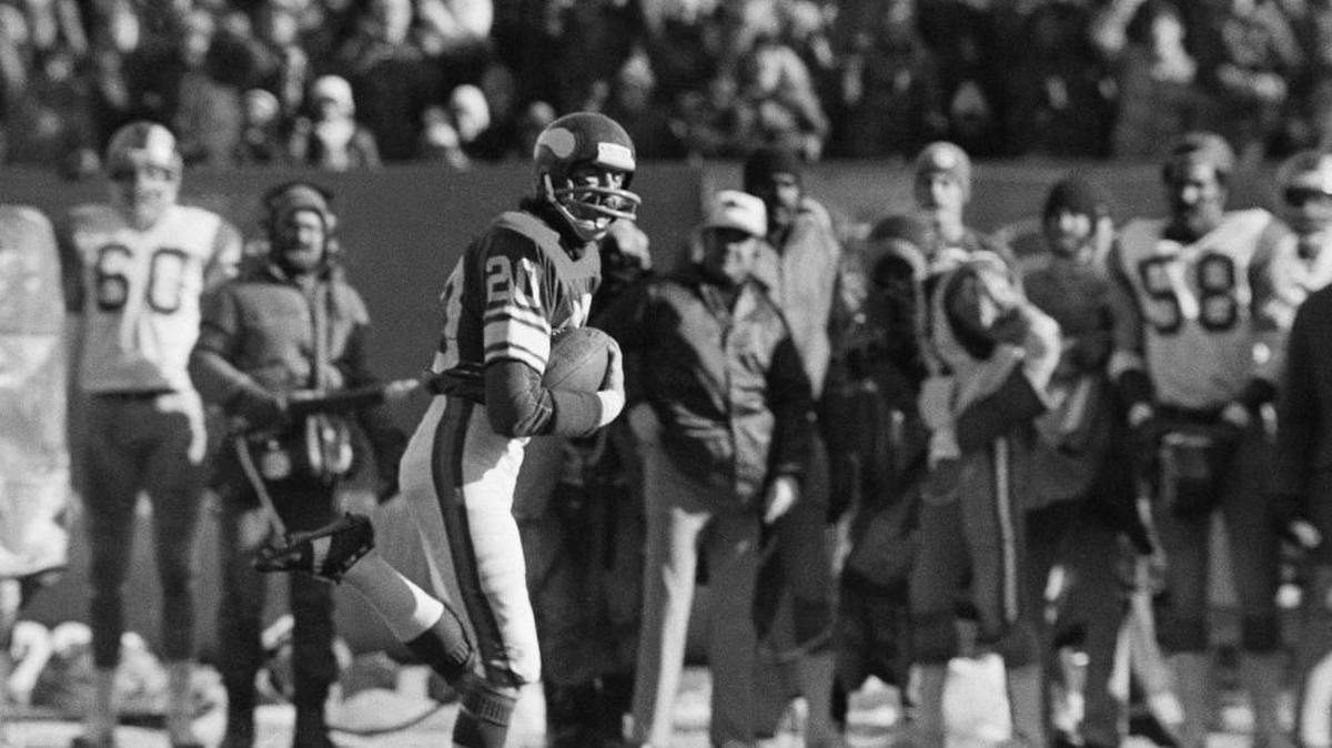 Defensive back Bobby Bryant of the Minnesota Vikings takes a look behind him as he heads for a touchdown during the 1976 NFC championship game.
