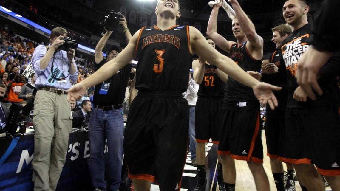 Mercer guard Kevin Canevari (3) dances and celebrates with his teammates after the Bears beat Duke in the NCAA Tournament in 2014.