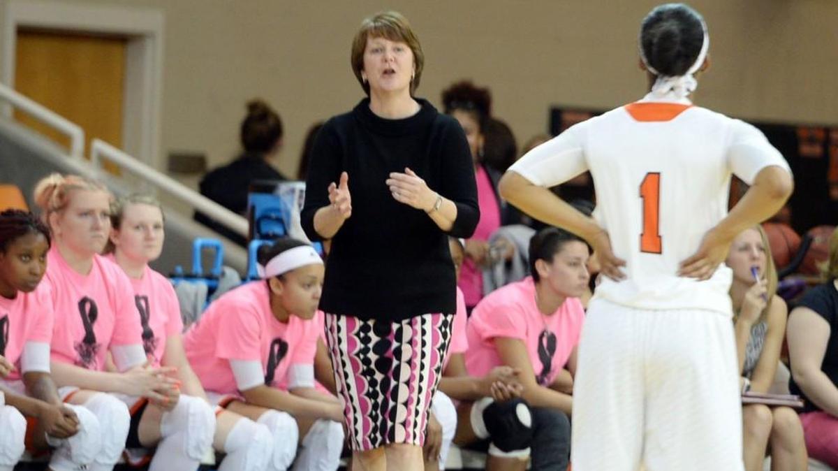 Mercer head coach Suzie Gardner shares instructions with Sydni Means in a game this season.