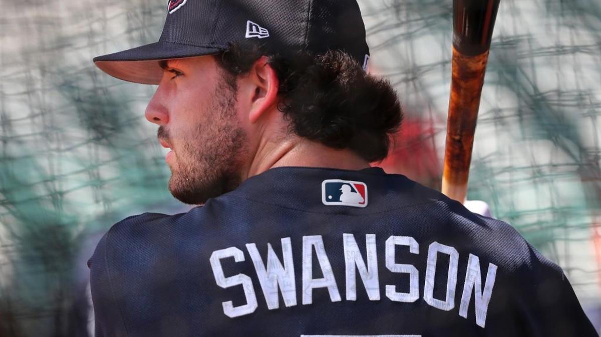 Atlanta Braves infielder Dansby Swanson takes batting practice during baseball spring training Monday, Feb. 20, 2017, in Lake Buena Vista, Fla.