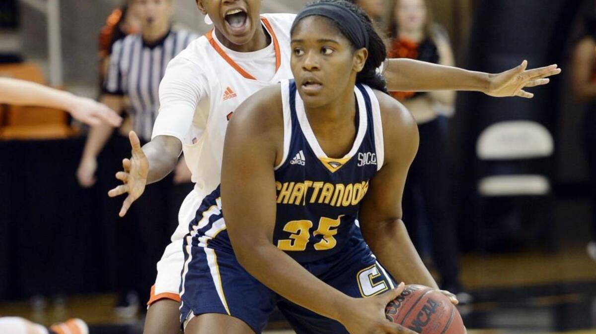 Alex Williams, back, and the Mercer Bears travel to UNC Greensboro on Thursday.