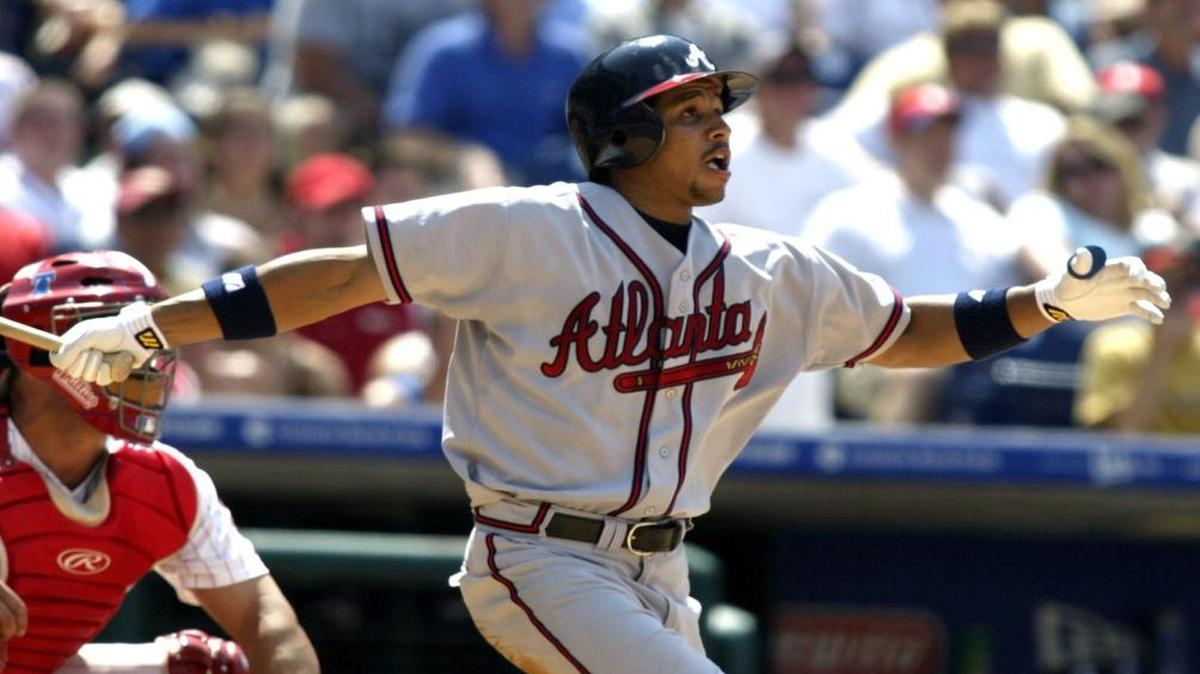 Atlanta Braves' Charles Thomas watches as his two-run home run leaves the park off Atlanta Braves reliever Rheal Cormier during the seventh inning Saturday, July 10, 2004, in Philadelphia. The Braves won 4-0.