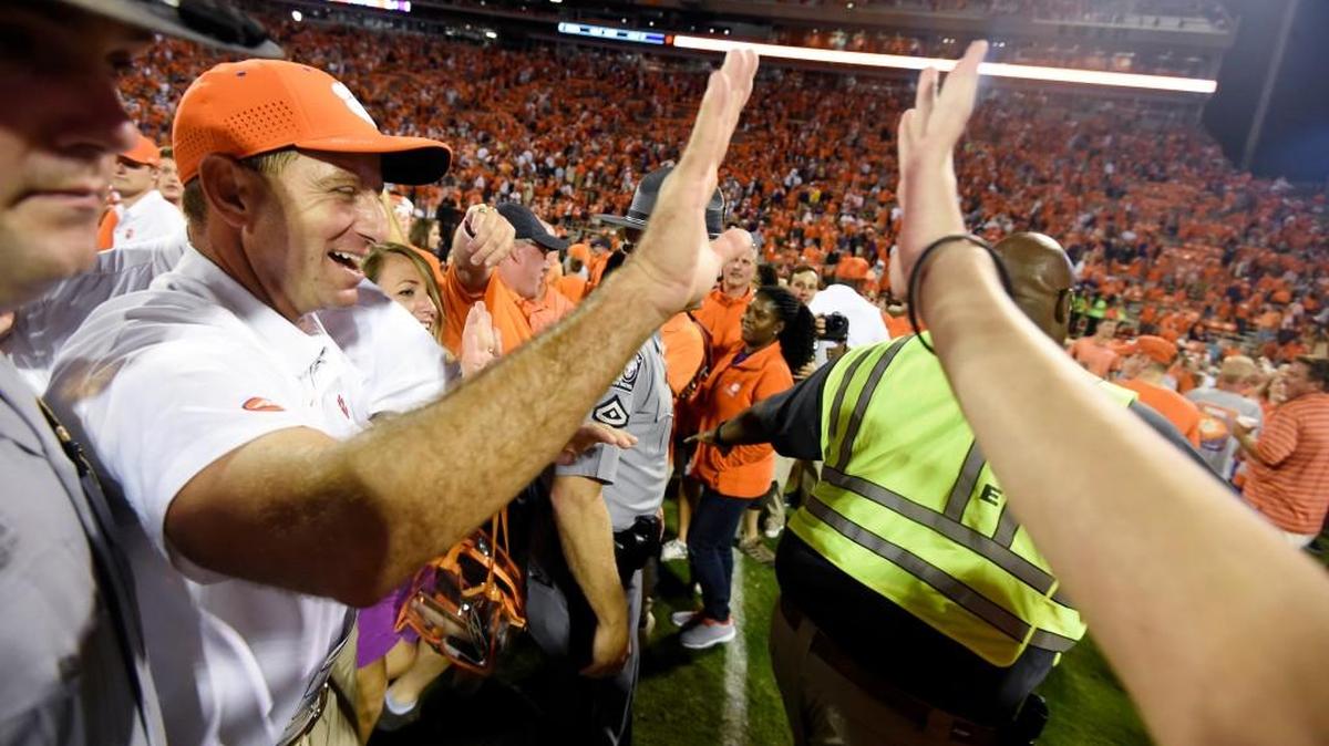 Clemson head coach Dabo Swinney leaves the field after defeating Auburn 14-6 during an NCAA college football game against, Saturday, Sept. 9, 2017, in Clemson, S.C.