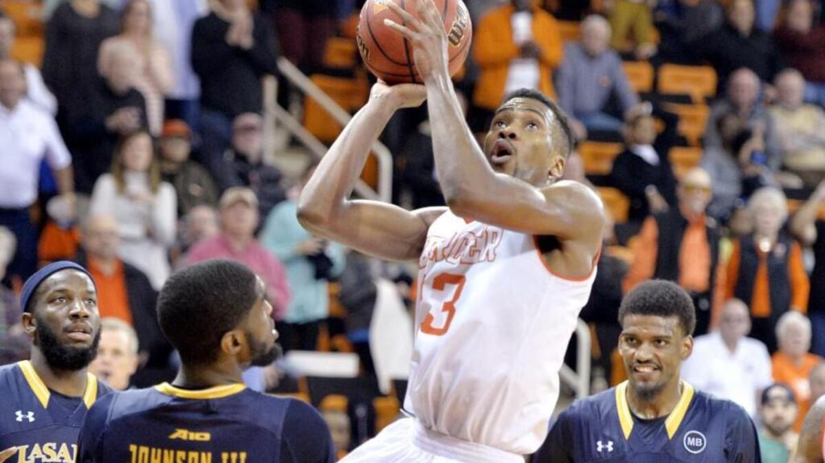 Mercer guard Demetre River (23) and the Bears play Monday at Furman.
