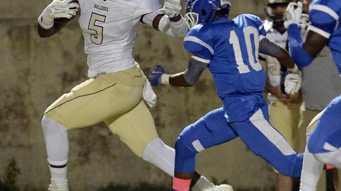 Mary Persons receiver Malik Herring (5) and the Bulldogs hold first place in GHSA Region 2-4A.
