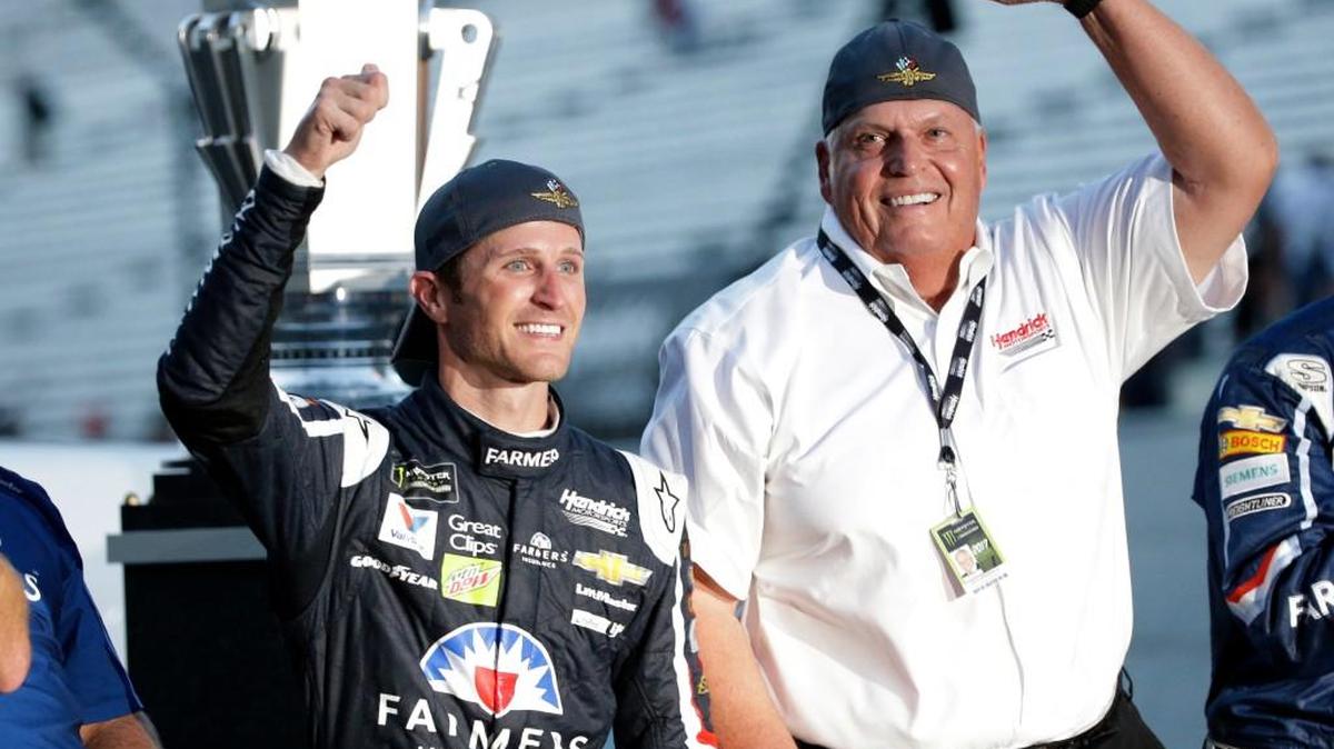 FILE - In this July 23, 2017, file photo, Kasey Kahne (5) celebrates with car owner Rick Hendrick after winning the NASCAR Brickyard 400 auto race at Indianapolis Motor Speedway in Indianapolis. Hendrick Motorsports and driver Kasey Kahne have agreed to part ways after six years. The team said in a statement Monday, Aug. 7, 2017, that Kahne has been released from the final year of his contract, allowing him to begin pursing a Monster Energy Cup ride for 2018.