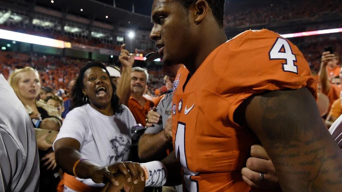 Clemson quarterback Deshaun Watson (4) walks off the field after Clemson defeated Louisville 42-36 on Saturday.