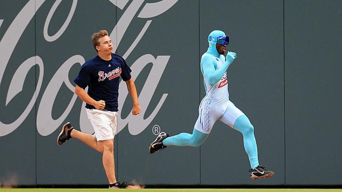 Former Peach County athlete, “The Freeze,” races a fan in between innings during a game between the Atlanta Braves and the New York Mets at SunTrust Park on June 10, 2017 in Atlanta, Georgia.