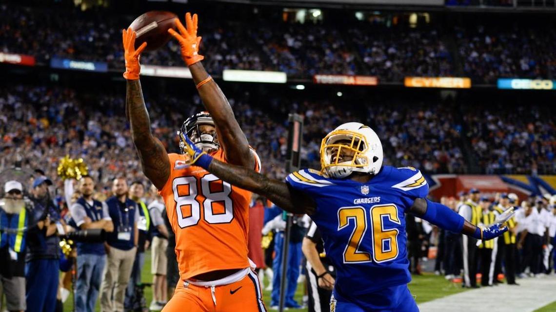 Denver Broncos wide receiver Demaryius Thomas (88) tries to make a catch past the defense of San Diego Chargers cornerback Casey Hayward on Thursday.