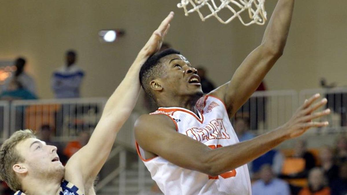 Mercer guard Demetre Rivers, right, is one of three Bears averaging in double figures in scoring.