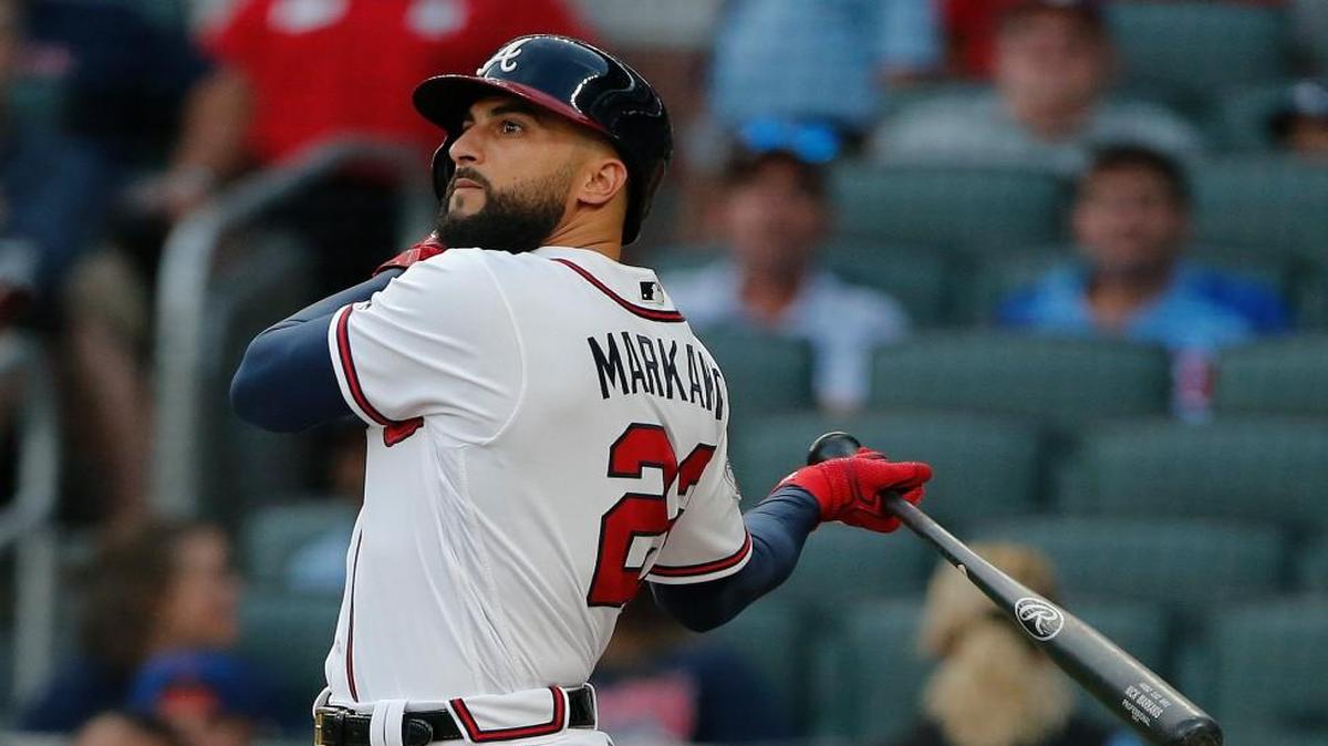 Atlanta Braves right fielder Nick Markakis (22) drives in a run with a base hit in the first inning of a baseball game against the Toronto Blue Jays Wednesday, May 17, 2017, in Atlanta.