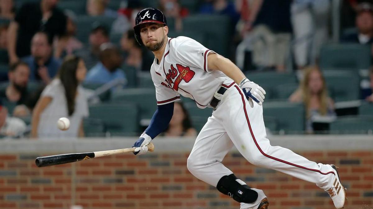 Atlanta Braves center fielder Ender Inciarte lays down a bunt Saturday.