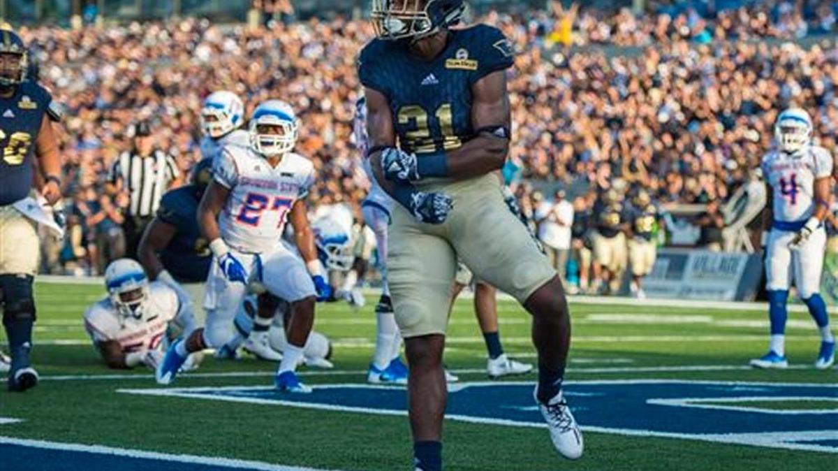 Georgia Southern running back Wesley Fields (21) celebrates after scoring a touchdown Saturday against Savannah State.