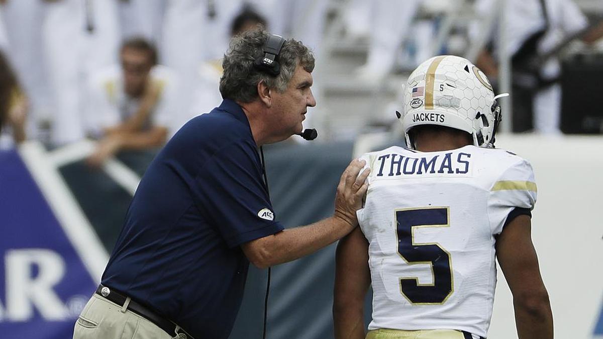 Georgia Tech head coach Paul Johnson, left, quarterback Justin Thomas and the Yellow Jackets are 4-3 overall.