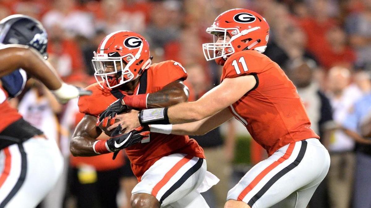 Fromm hands off to D'Andre Swift against Samford.