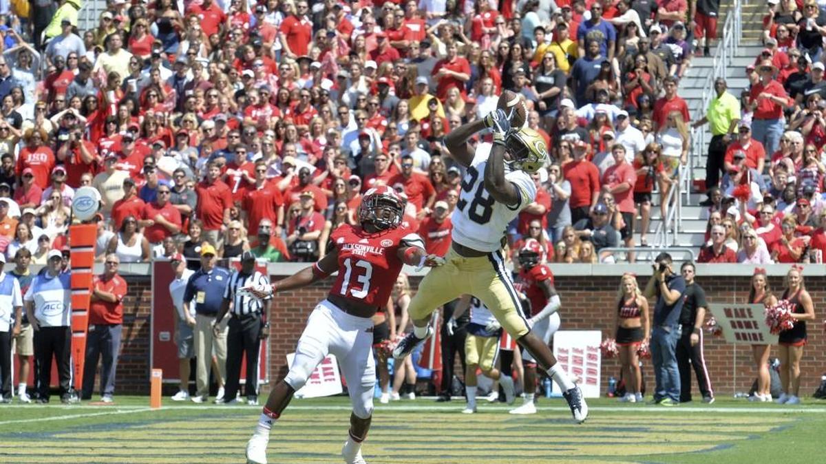 Georgia Tech running back J.J. Green (28) makes a touchdown catch over Jacksonville State Traco Williams (13) during the second half of an NCAA college football game, Saturday, Sept. 9, 2017 in Atlanta. Georgia Tech defeated Jacksonville St. 37-10.