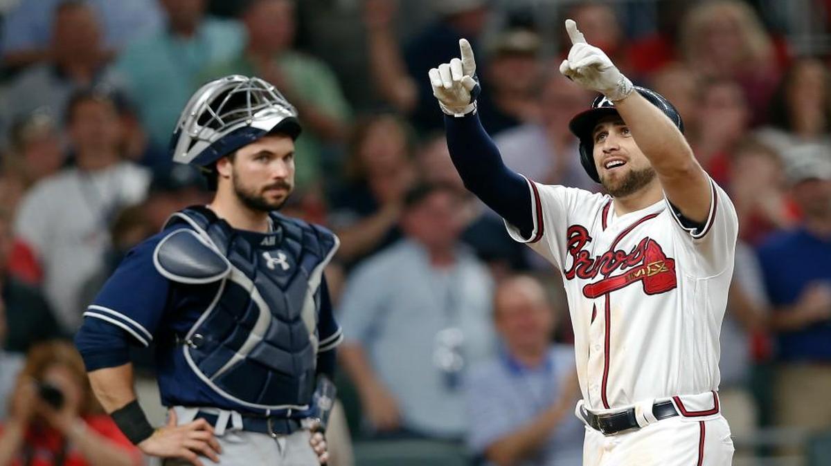 Atlanta’s Ender Inciarte, right, hit the first home run at SunTrust Park on Friday.