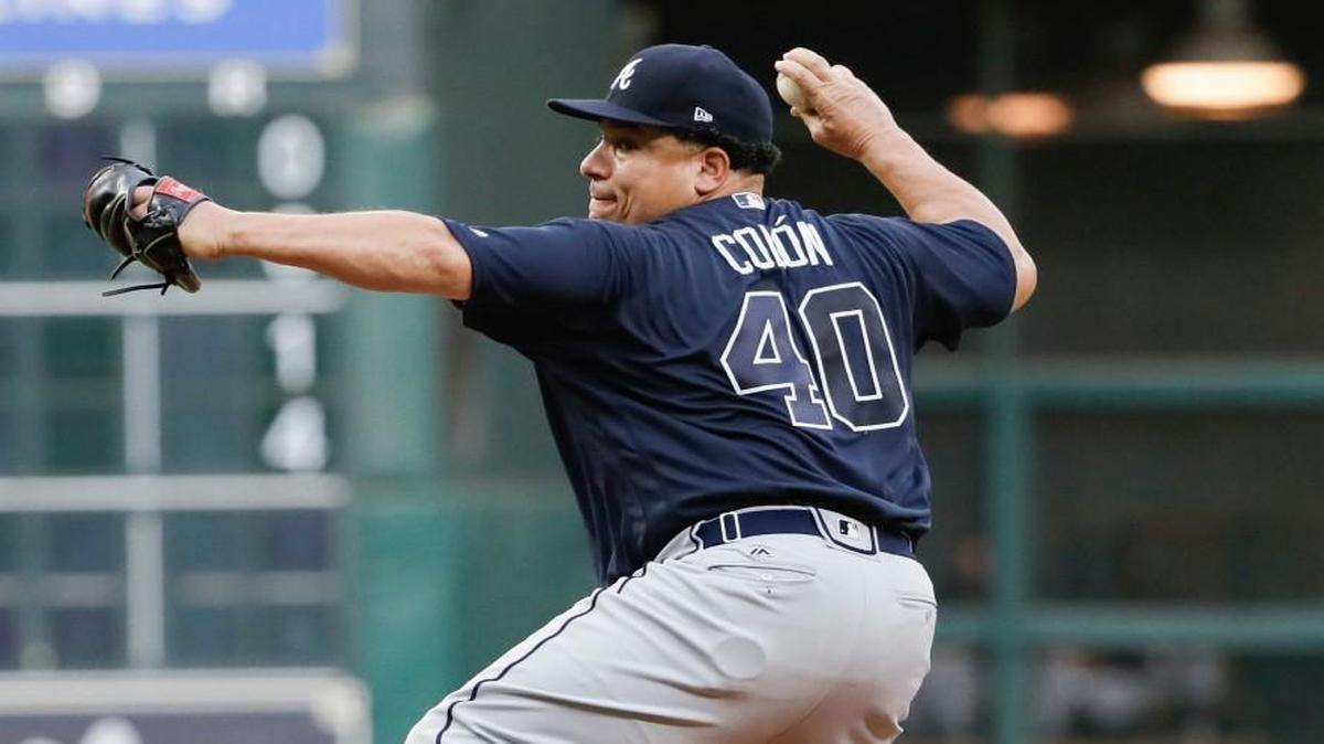 Atlanta Braves starting pitcher Bartolo Colon throws against the Houston Astros during the first inning of a baseball game, Tuesday, May 9, 2017, in Houston.