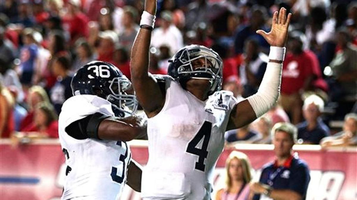 Georgia Southern running back Matt Breida (36) celebrates with quarterback Kevin Ellison after Ellison's touchdown against South Alabama on Saturday.