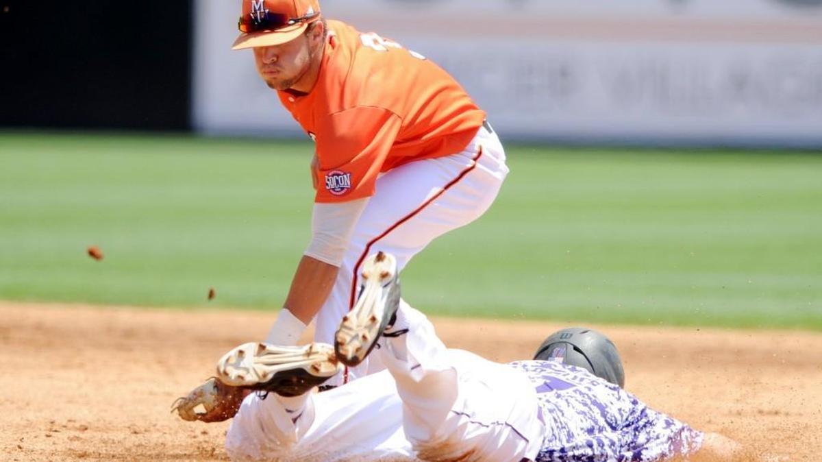 Mercer second baseman Ryan Hagan (3) tags out Furman’s Sky Overton on an attempted steal during their game Sunday.