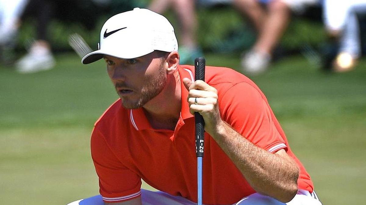 Russell Henley lines up a putt on the second green during the final round of the Masters on Sunday.
