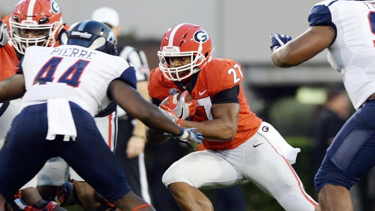 Georgia running back Nick Chubb (27) runs for first down yardage against Samford.