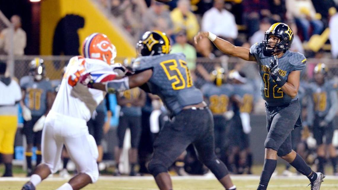 Peach County quarterback Antonio Gilbert (12) and the Trojans face Rutland on Friday.