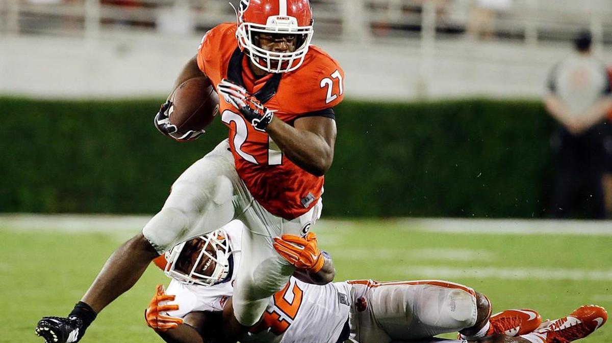 Georgia’s Nick Chubb, left, makes his return from a knee injury suffered last year in Saturday’s game against North Carolina.