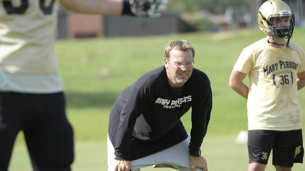 Mary Persons head coach Brian Nelson puts his team through drills during practice