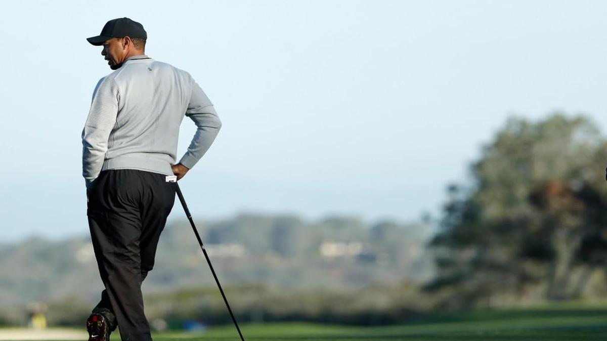 Tiger Woods waits after hitting his tee shot on the sixth hole of the north course during the Pro-Am event of the Farmers Insurance Open golf tournament Wednesday.