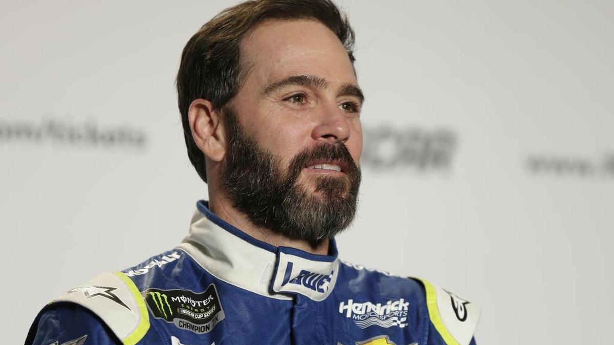Jimmie Johnson answers a question during a news conference at the NASCAR Media Tour in Charlotte, N.C., Tuesday, Jan. 24, 2017.