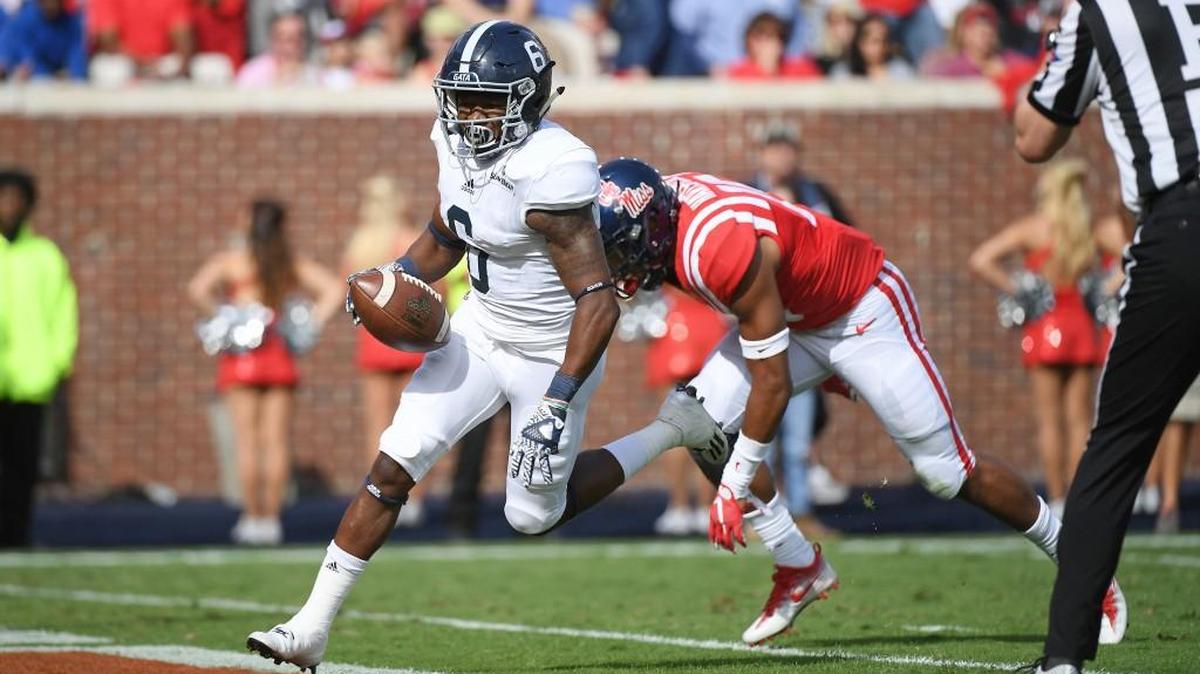 Georgia Southern wide receiver Myles Campbell (6) scores past Mississippi defensive back Myles Hartsfield on Saturday.