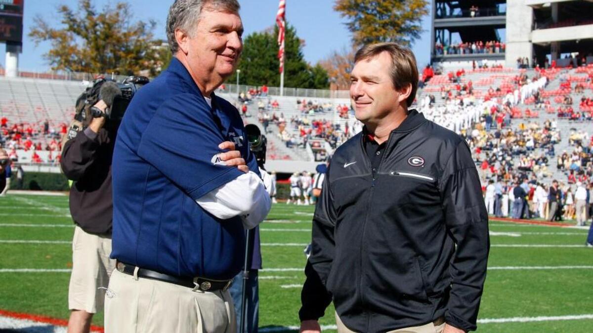 Georgia Tech head coach Paul Johnson, left, and Georgia head coach Kirby Smart are both going bowling this month.