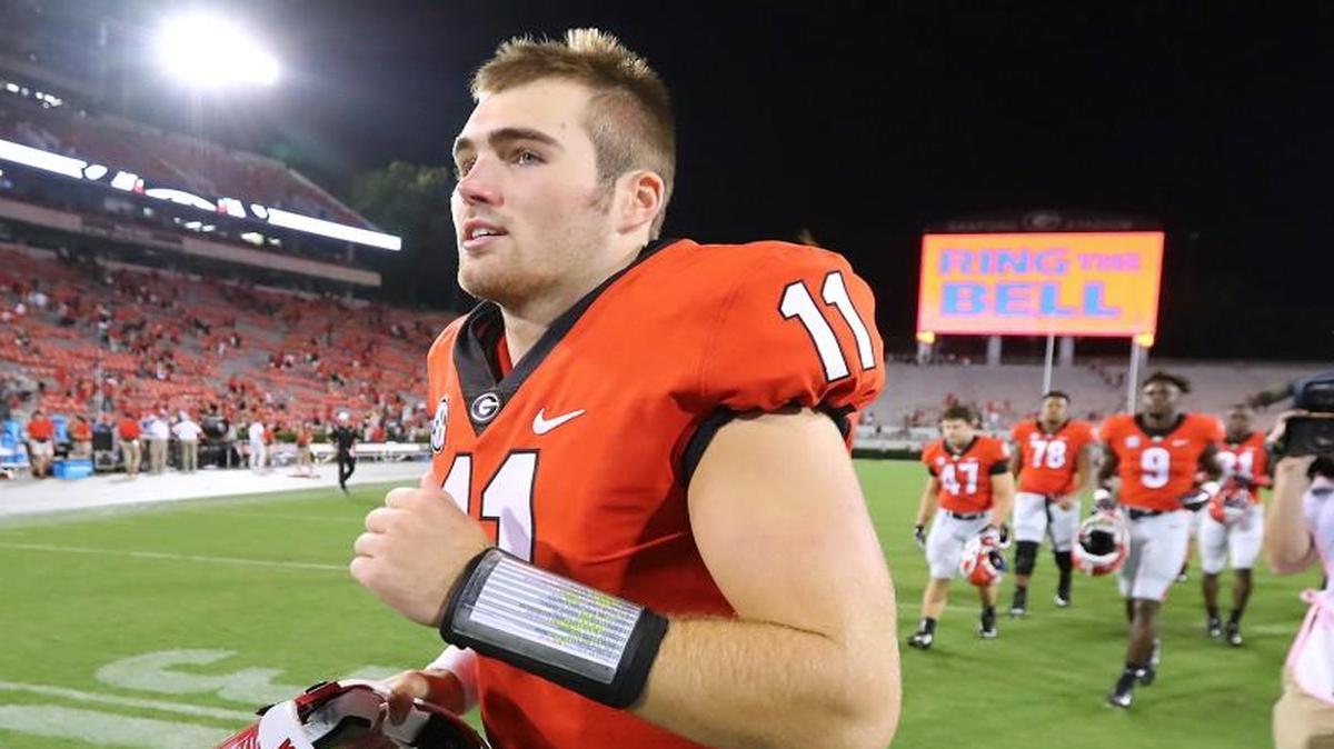 FILE - In this Sept. 2, 2017, file photo, Georgia quarterback Jake Fromm heads off the field after the team's 31-10 victory over Appalachian State in an NCAA college football game, in Athen, Ga. Freshman Jake Fromm flourished in a relief role in his debut for No. 15 Georgia, but now comes a different test. Fromm's first start comes Saturday at No. 24 Notre Dame, and his teammates insist he packs the resolve needed to handle the challenge.