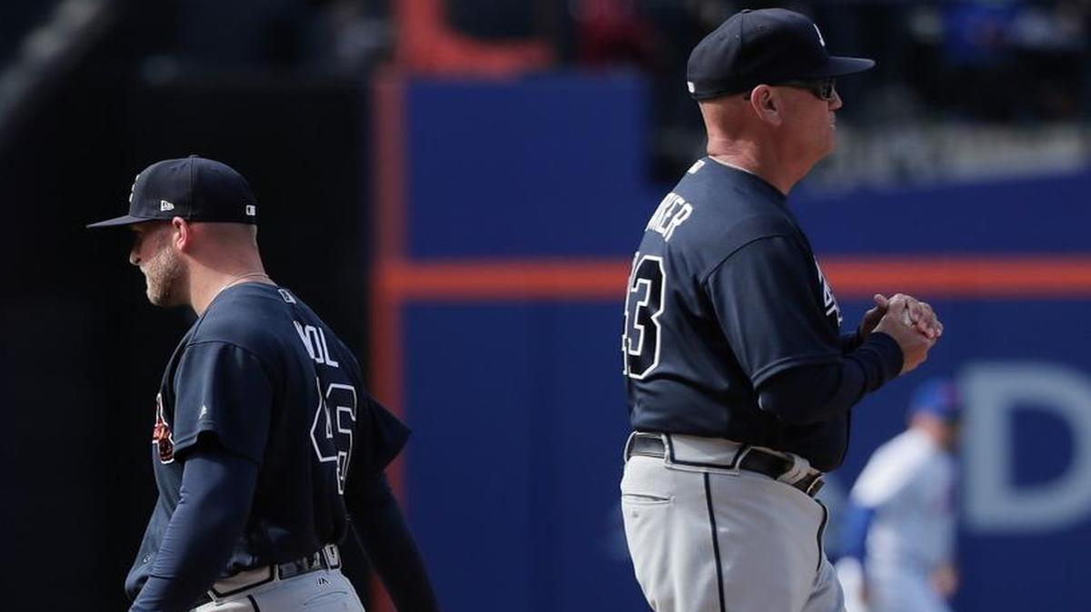 Atlanta Braves pitcher Ian Krol (46) walks off the mound as he is relieved by manager Brian Snitker on Monday.