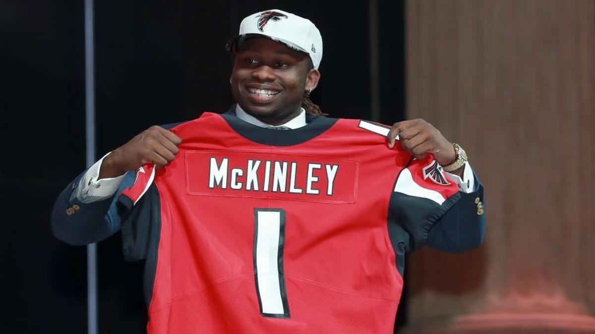 UCLA's Takkarist McKinley poses after being selected by the Atlanta Falcons during the first round of the 2017 NFL football draft, Thursday, April 27, 2017, in Philadelphia.