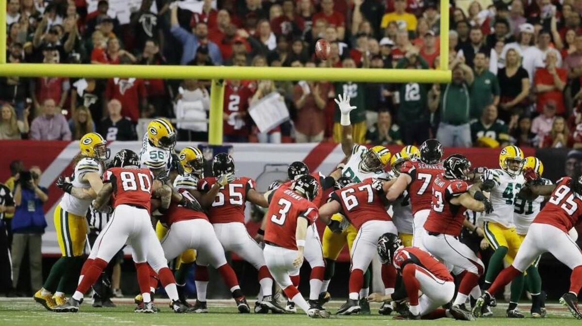 Atlanta’s Matt Bryant kicks a field goal Sunday against Green Bay.