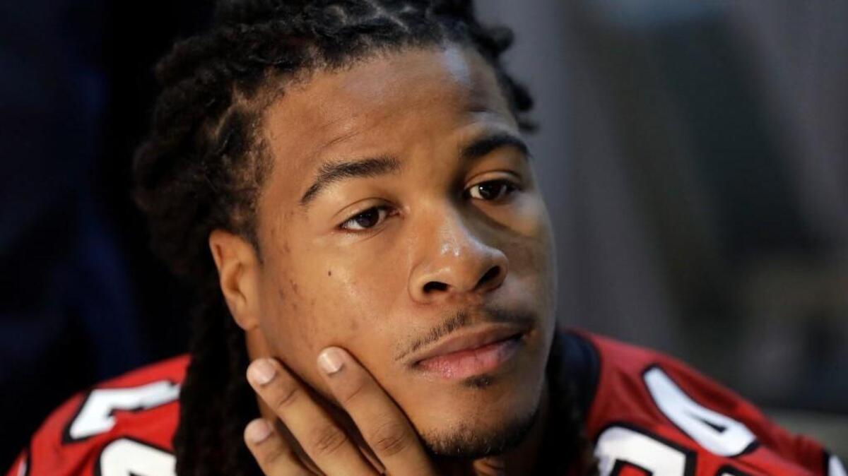 Atlanta Falcons running back Devonta Freeman has concussion symptoms and has been ruled out for this week's preseason game at Pittsburgh. Freeman left Sunday's practice with heat-related issues. Coach Dan Quinn said Monday, Aug. 14, 2017, that Freeman reported the concussion symptoms after leaving the field and has been placed in the concussion protocol.(AP Photo/Eric Gay, File)