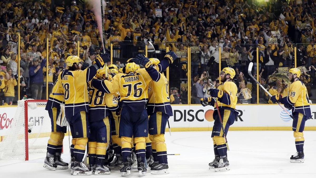 Nashville Predators players celebrate after beating the Anaheim Ducks in Game 6 of the Western Conference final in the NHL hockey Stanley Cup playoffs Monday, May 22, 2017, in Nashville, Tenn. The Predators won 6-3 to win the series 4-2 and advance to the Stanley Cup Final.