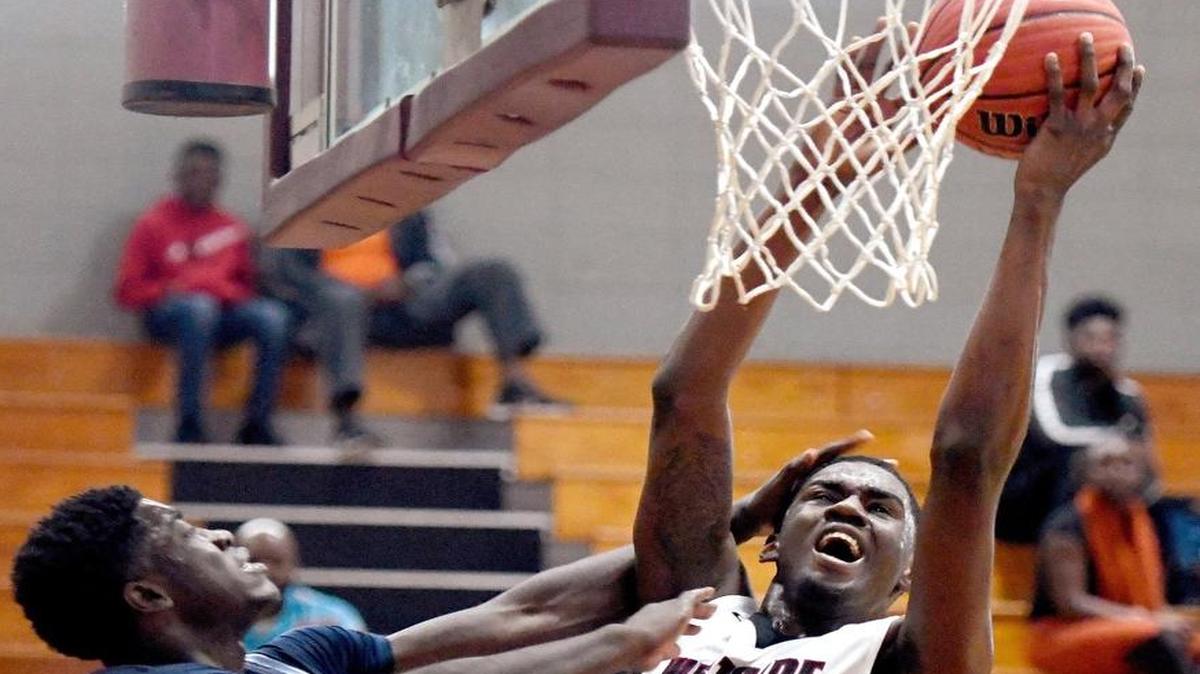 Westside's Khavon Moore (21) goes up for a shot during their first round GHSA playoff game against Long County Saturday.
