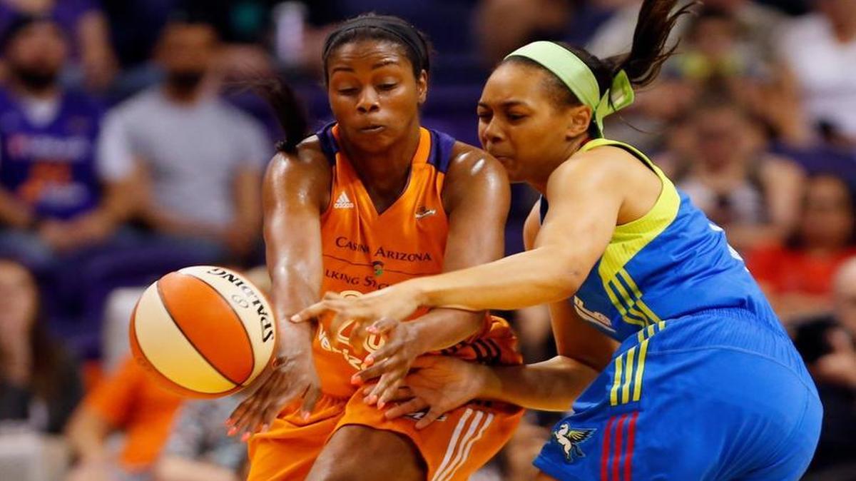 Allisha Gray battles Phoenix forward Camille Little (20) in a WNBA game last month. Gray, of Washington County, was the WNBA’s first Rookie of the Month this season.