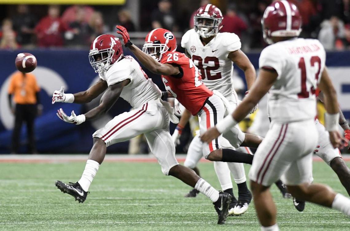 Georgia defensive back Tyrique McGhee (26) covers Alabama receiver Jerry Jeudy (4) during the Crimson Tide’s 35-28 SEC Championship win Saturday.