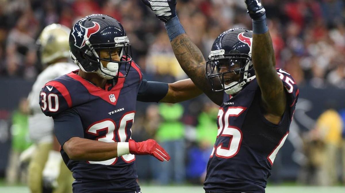 Houston Texans cornerback Kareem Jackson, right, celebrates a play with strong safety Kevin Johnson during a game last season.